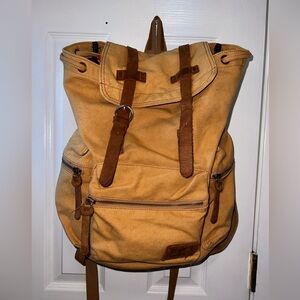 Bundle Deal: Ecocity Tan Book Pack & Jean Paul Gaultier Blue Striped Backpack